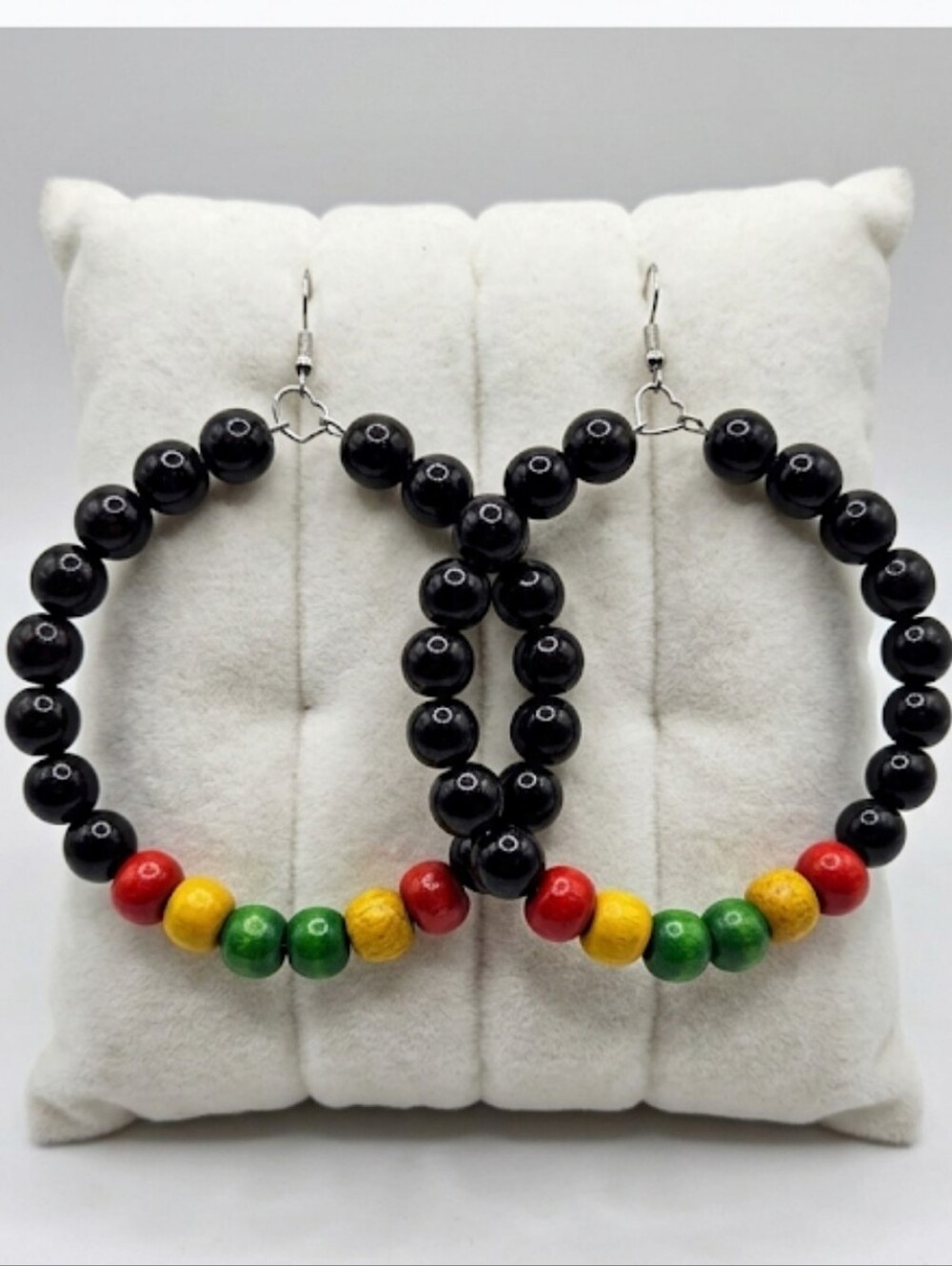 Elegant hoop earrings featuring Black and multicolored wooden beads. Their light - Picture 2 of 7